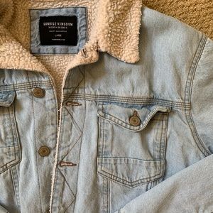 Sunrise Kingdom Lightwash Denim Jean Jacket with Sherpa like  lining.
